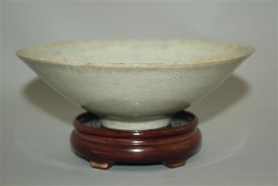 A Chinese Yingqing conical shaped bowl, Song dynasty, 17.5cm, wear to glaze